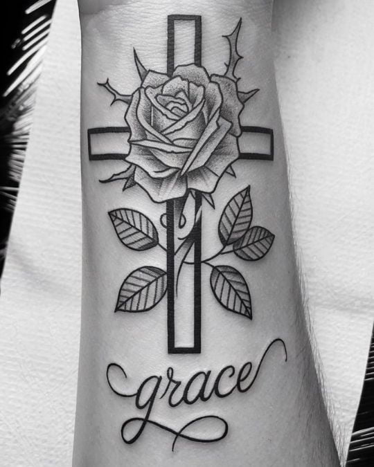 Rose and Cross Tattoo with 'Grace' Script on Wrist - Black and White Religious Ink Design